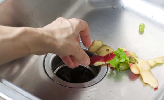 Garbage disposal failing to property process food remains in a sink