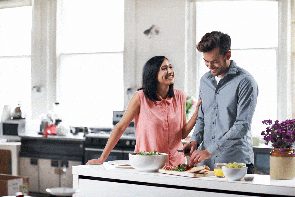 couple in kitchen plumbing service plano tx dallas tx