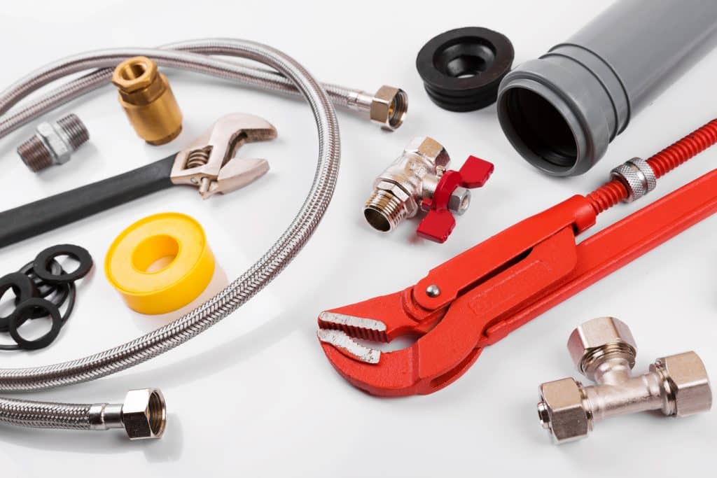 Plumbing Tools for Plumbing Emergencies on a white background.