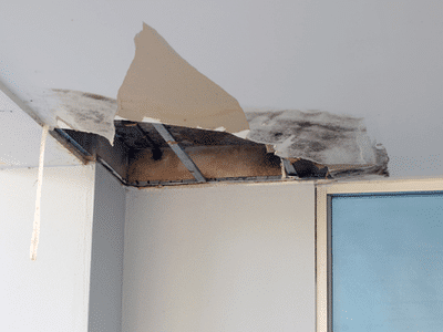 A damaged ceiling from leaking pipe.