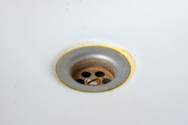 A ring of rust around a sink drain