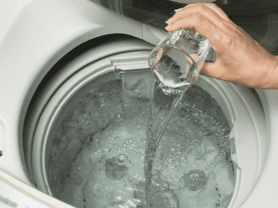 Clean your washing machine with hot water and vinegar.