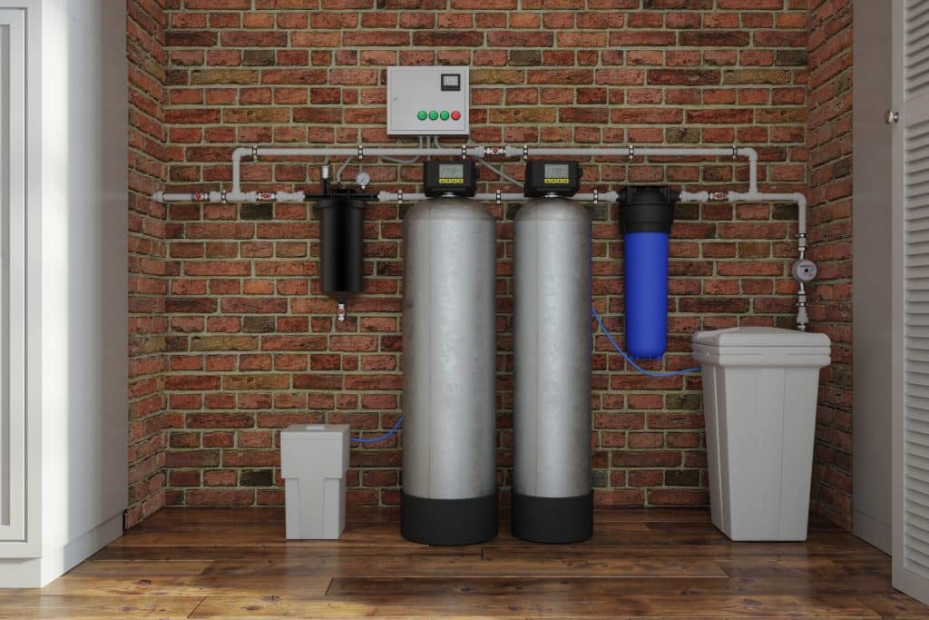 Front view of the house with a well water filtration system and water softener System.
