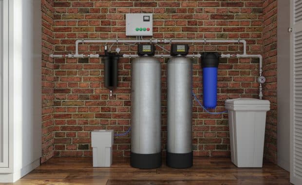 Front view of the house with a well water filtration system and water softener System.
