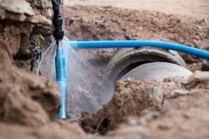 A burst water main.