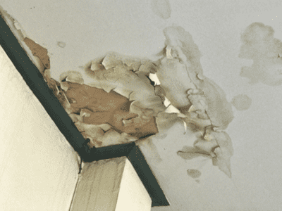 Damaged ceiling after a pipe burst