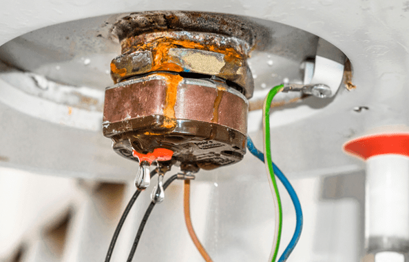 corroded water heater leaking from bottom