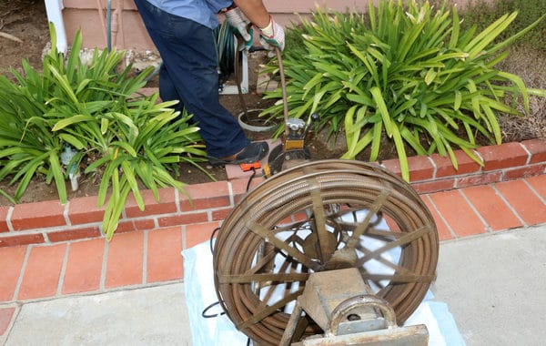 using a plumbing snake