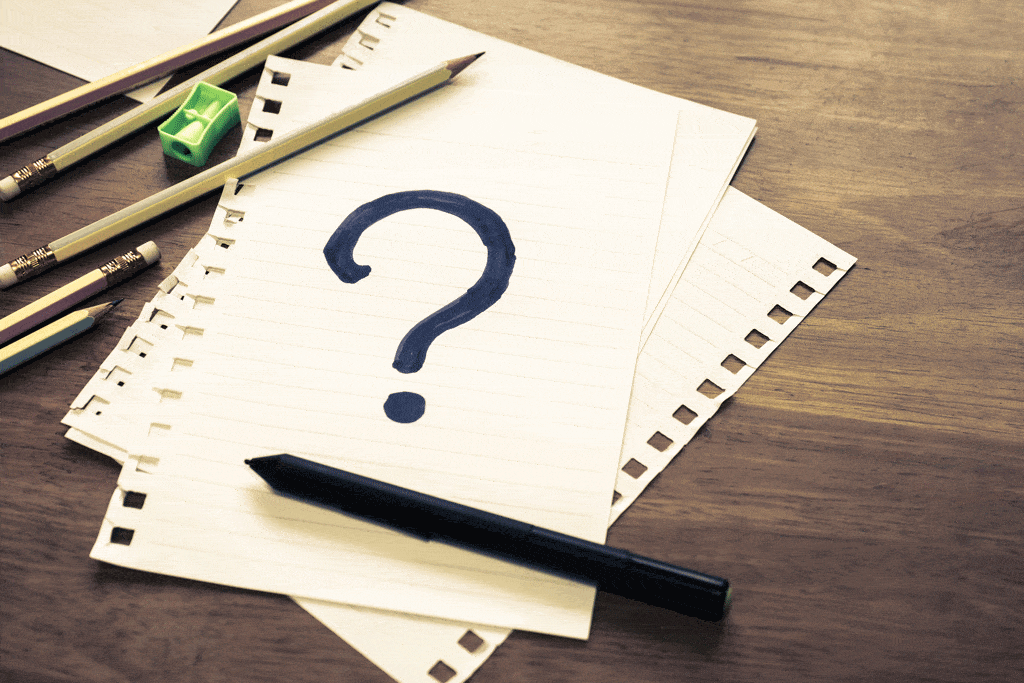 question mark on white piece of paper with a pen emergency plumbing services dallas tx frisco tx carrollton tx