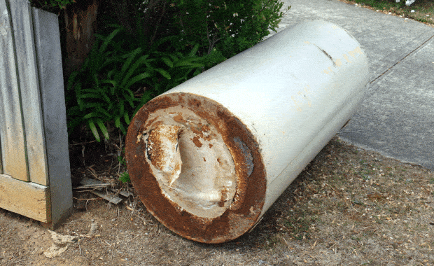 water heater laying on the ground outside water heater replacement frisco tx plano tx dallas tx